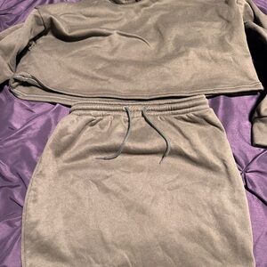 Army green skirt and crop jacket. This is like jogging suit material . Size larg